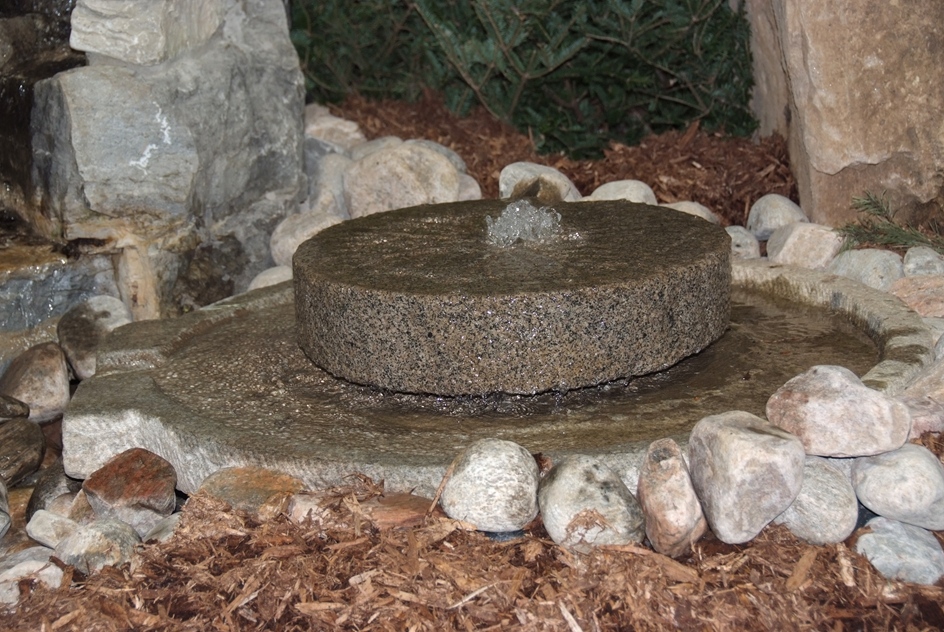 Mill Stone Water Feature on a Mill Stone Base